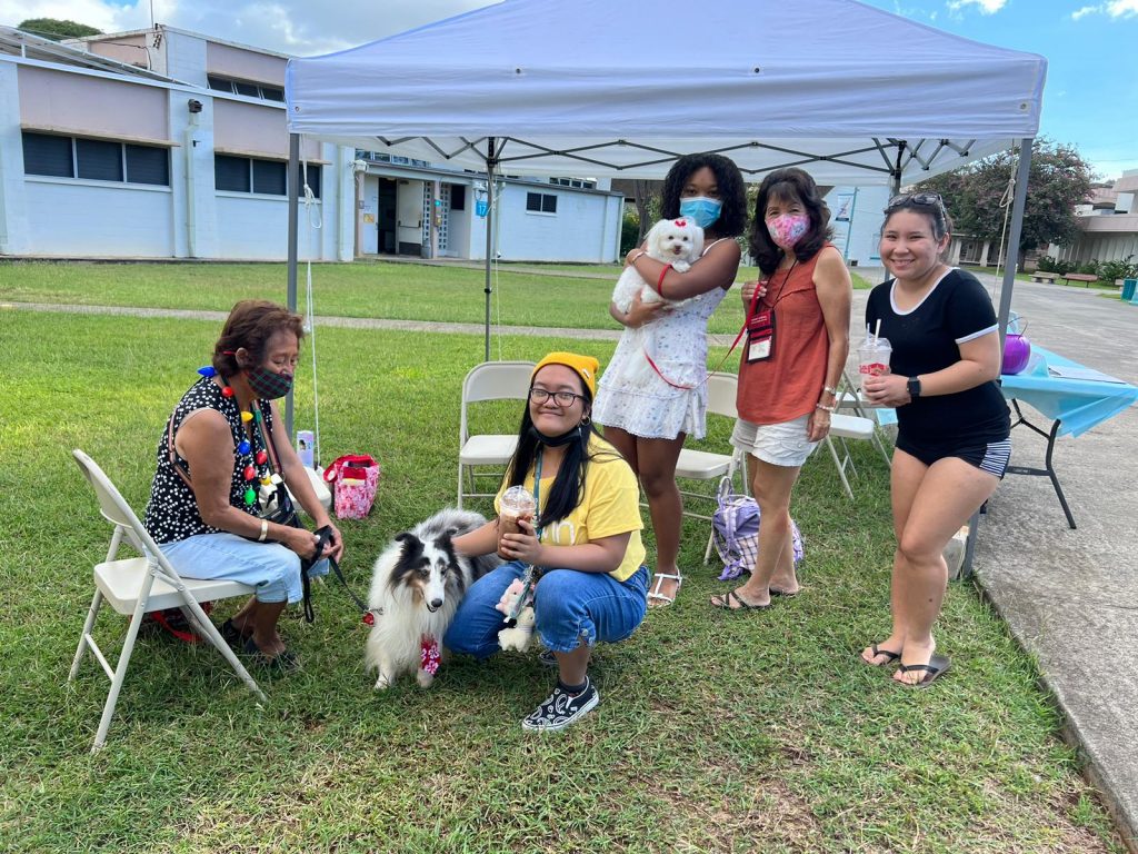 students petting dogs for pet therapy